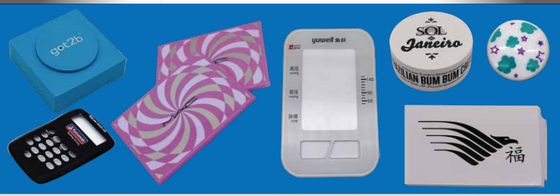 Machine à imprimer à écran plat conçue pour imprimer sur des tubes en plastique, des boîtes rondes et des bouchons avec alimentation automatique et durcissement par rayons UV